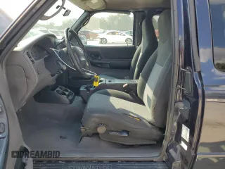 2003 Ford Ranger XLT Appearance with VIN 1FTYR44E13PA51816, listed as a Copart auction lot 44396595 with 250,453 mi miles and Salvage Title. Bid and sale history available at carsss.com. Image 7.