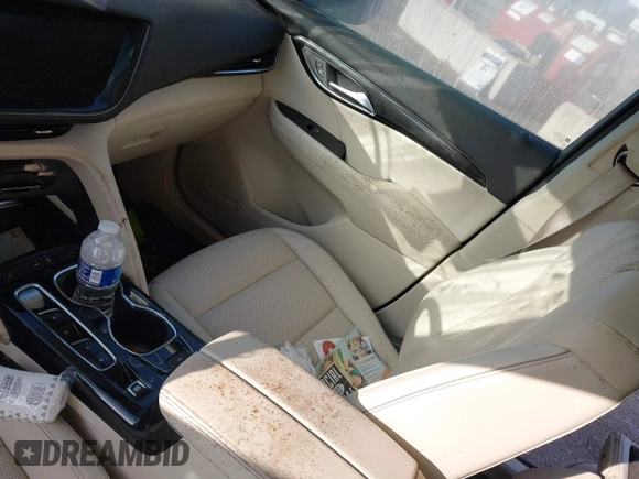 2021 Buick Envision Essence with VIN LRBFZNR43MD085335, listed as a IAAI auction lot 41967870 with 74,323 mi miles. Bid and sale history available at carsss.com. Image 5.