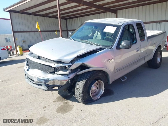 2000 Ford F-150 XL with VIN 1FTRX18L9YKA05396, listed as a IAAI auction lot 41637310 with 234,555 mi miles. Bid and sale history available at carsss.com. Image 6.