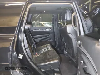 2017 Jeep Grand Cherokee SRT with VIN 1C4RJFDJ9HC819478, listed as a IAAI auction lot 41325490 with 63,551 mi miles. Bid and sale history available at carsss.com. Image 8.