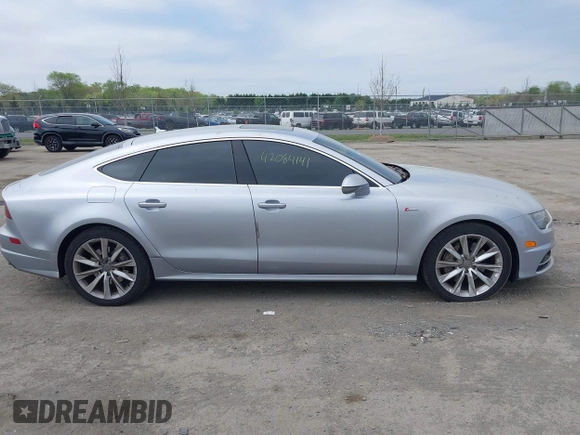 2016 Audi A7 Prestige z VIN WAU2GAFC6GN007637, wystawiony jako IAAI lot #42084141 z przebiegiem 131 213 mil mil oraz . Historia ofert i sprzedaży dostępna na DreamBid. Obrazek 13.