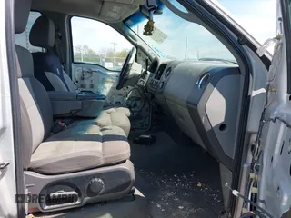 2005 Ford F-150 XLT with VIN 1FTPW12505KD72168, listed as a IAAI auction lot 42063810 with 232,964 mi miles. Bid and sale history available at carsss.com. Image 5.