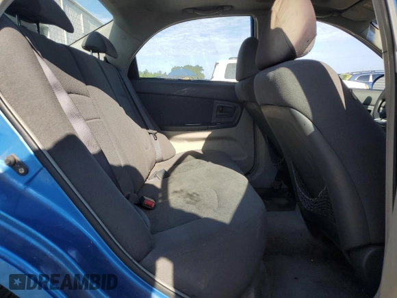 2005 Kia Spectra LX z VIN KNAFE121655113045, wystawiony jako Copart lot #61199595 z przebiegiem 156 310 mil mil oraz Szkoda całkowita • Salvage title. Historia ofert i sprzedaży dostępna na DreamBid. Obrazek 10.