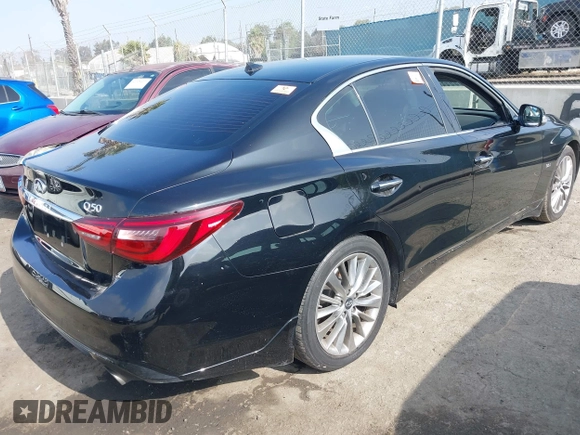 2018 Infiniti Q50 Luxe with VIN JN1EV7AP9JM358741, listed as a IAAI auction lot 42345835 with 101,544 mi miles and . Bid and sale history available at DreamBid. Image 4.