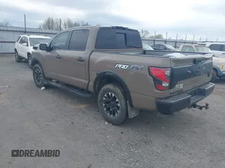 2021 Nissan Titan SL z VIN 1N6AA1ED6MN526285, wystawiony jako IAAI lot #41866324 z przebiegiem 80 524 mil mil oraz . Historia ofert i sprzedaży dostępna na DreamBid. Obrazek 3.