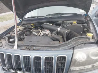 2003 Jeep Grand Cherokee Limited with VIN 1J4GW58N43C521617, listed as a IAAI auction lot 41781064 with 228,086 mi miles. Bid and sale history available at carsss.com. Image 10.