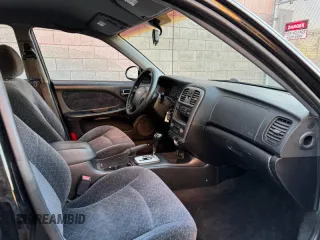 2004 Hyundai Sonata with VIN KMHWF25H94A000139, listed as a Copart auction lot 84455464 with 129,267 mi miles and Clean Title. Bid and sale history available at carsss.com. Image 5.