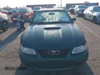 2000 Ford Mustang with VIN 1FAFP444XYF207441, listed as a IAAI auction lot 42120700 with 119,335 mi miles. Bid and sale history available at carsss.com. Image 12.
