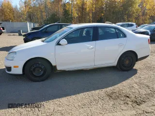 2009 Volkswagen Jetta S z VIN 3VWHM71K49M099655, wystawiony jako Copart lot #75485344 z przebiegiem 173 212 mil mil oraz Czysty tytuł • Clean title. Historia ofert i sprzedaży dostępna na DreamBid. Obrazek 1.