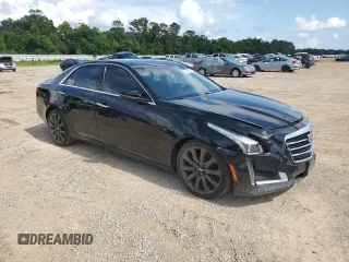 2016 Cadillac CTS AWD z VIN 1G6AW5SX7G0117775, wystawiony jako Copart lot #56944594 z przebiegiem 99 117 mil mil oraz Szkoda całkowita • Salvage title. Historia ofert i sprzedaży dostępna na DreamBid. Obrazek 4.