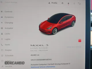 2021 Tesla Model 3 Long Range with VIN 5YJ3E1EB4MF936743, listed as a IAAI auction lot 42154322 with 46,983 mi miles and . Bid and sale history available at DreamBid. Image 7.