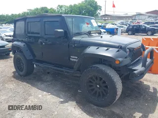 2013 Jeep Wrangler Unlimited Sport z VIN 1C4BJWDG1DL619095, wystawiony jako IAAI lot #42278459 z przebiegiem 144 400 mil mil oraz . Historia ofert i sprzedaży dostępna na DreamBid. Obrazek 1.