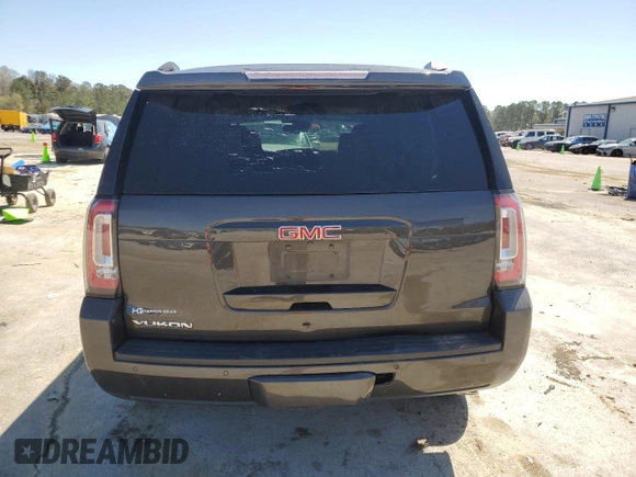 2019 GMC Yukon SLT with VIN 1GKS1BKC1KR117730, listed as a Copart auction lot 49438235 with 147,347 mi miles and Salvage Title. Bid and sale history available at carsss.com. Image 6.
