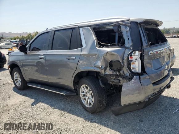 2021 Chevrolet Tahoe LS with VIN 1GNSCMKD3MR227893, listed as a Copart auction lot 65713735 with 87,255 mi miles and Salvage title. Bid and sale history available at DreamBid. Image 2.