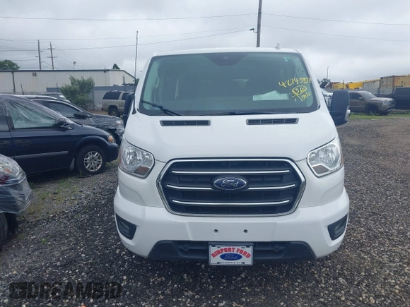 2020 Ford Transit Passenger XL with VIN 1FBAX2Y87LKA09619, listed as a IAAI auction lot 42743359 with 79,822 mi miles and . Bid and sale history available at DreamBid. Image 12.