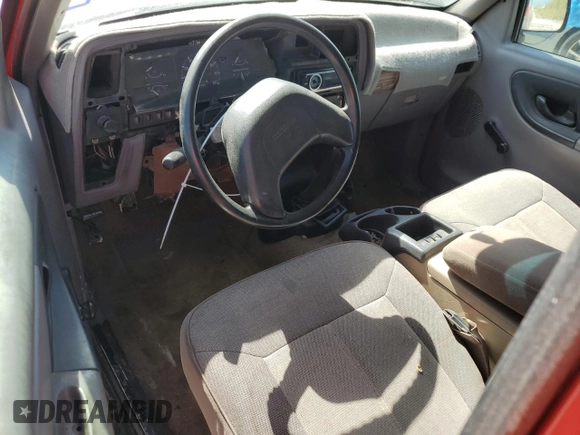 1994 Mazda B-Series Truck z VIN 4F4CR12AXRTN07635, wystawiony jako Copart lot #66788284 z przebiegiem 255 020 mil mil oraz Szkoda całkowita • Salvage title. Historia ofert i sprzedaży dostępna na DreamBid. Obrazek 8.