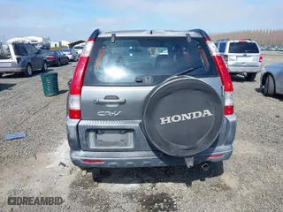 2006 Honda CR-V LX with VIN JHLRD68516C006561, listed as a IAAI auction lot 41855457 with 215,139 mi miles. Bid and sale history available at carsss.com. Image 16.