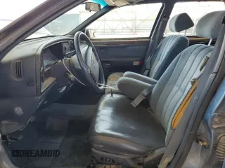 1990 Mercury Sable z VIN 1MECM5348LG630484, wystawiony jako Copart lot #45757565 z przebiegiem 98 764 mil mil oraz Szkody całkowita. Historia ofert i sprzedaży dostępna na DreamBid. Obrazek 7.