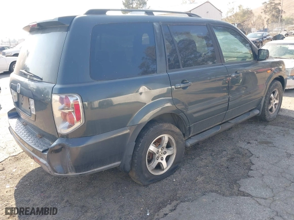 2006 Honda Pilot EX-L with RES with VIN 5FNYF28636B021196, listed as a IAAI auction lot 41461805 with 328,491 mi miles. Bid and sale history available at carsss.com. Image 4.