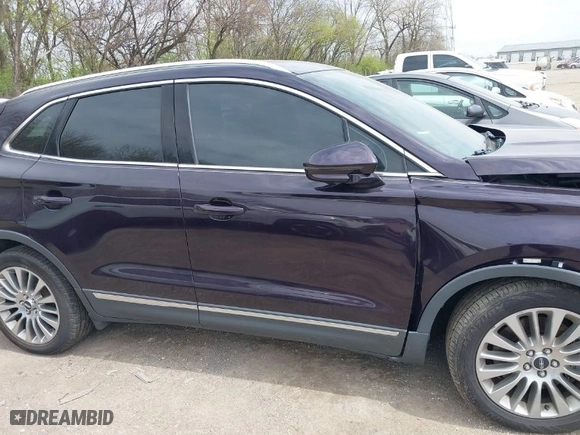 2015 Lincoln MKC with VIN 5LMTJ2AH5FUJ20686, listed as a IAAI auction lot 42037069 with 134,122 mi miles. Bid and sale history available at carsss.com. Image 13.