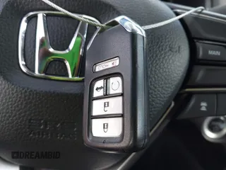 2020 Honda Accord with VIN 1HGCV3F11LA009242, listed as a IAAI auction lot 41516135 with 62,725 mi miles and . Bid and sale history available at DreamBid. Image 11.