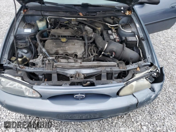 1999 Ford Escort LX z VIN 1FAFP10P6XW211371, wystawiony jako Copart lot #82523444 z przebiegiem 122 534 mil mil oraz Szkody całkowita. Historia ofert i sprzedaży dostępna na DreamBid. Obrazek 11.
