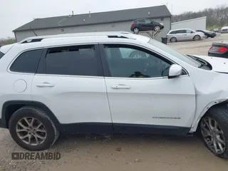 2014 Jeep Cherokee Latitude with VIN 1C4PJMCSXEW150735, listed as a IAAI auction lot 42020944 with 76,303 mi miles and . Bid and sale history available at carsss.com. Image 14.