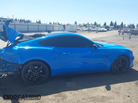 2022 Ford Mustang GT with VIN 1FA6P8CFXN5107884, listed as a IAAI auction lot 41992310 with 34,673 mi miles and . Bid and sale history available at DreamBid. Image 14.