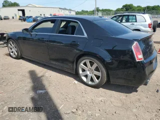 2012 Chrysler 300 SRT8 with VIN 2C3CCAFJ6CH800641, listed as a Copart auction lot 61313094 with 107,426 mi miles and Salvage Title. Bid and sale history available at carsss.com. Image 2.