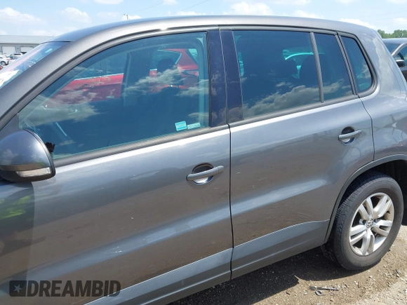 2012 Volkswagen Tiguan SE with VIN WVGAV7AX9CW004362, listed as a IAAI auction lot 42260316 with 163,444 mi miles and . Bid and sale history available at DreamBid. Image 14.