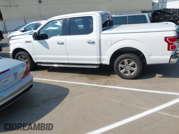 2019 Ford F-150 XL with VIN 1FTEW1C44KKC60773, listed as a IAAI auction lot 42706042 with 185,864 mi miles and . Bid and sale history available at DreamBid. Image 15.