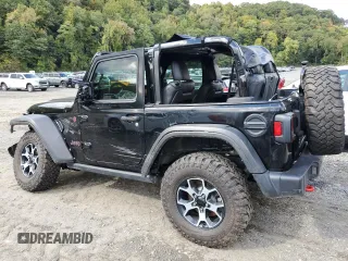 2023 Jeep Wrangler Rubicon with VIN 1C4HJXCGXPW545938, listed as a Copart auction lot 73939634 with 13,590 mi miles and Salvage title. Bid and sale history available at DreamBid. Image 2.