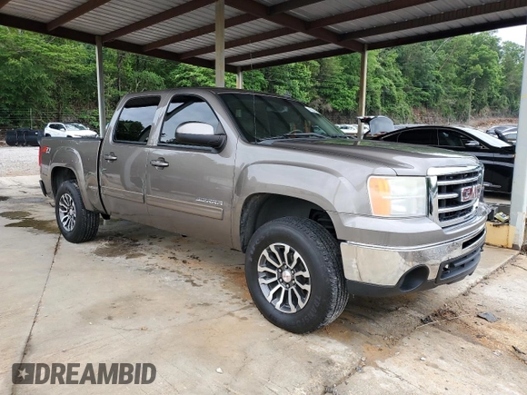 2012 GMC Sierra 1500 SLT with VIN 3GTP2WE74CG310914, listed as a Copart auction lot 56049905 with 106,882 mi miles and Salvage title. Bid and sale history available at DreamBid. Image 4.