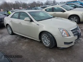 2010 Cadillac CTS Luxury with VIN 1G6DG5EG2A0109533, listed as a IAAI auction lot 41659590 with 110,749 mi miles and . Bid and sale history available at DreamBid. Image 1.