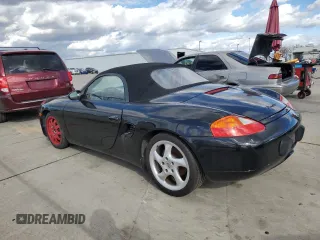 2000 Porsche Boxster z VIN WP0CA2988YU627807, wystawiony jako Copart lot #45522955 z przebiegiem 120 384 mil mil oraz Szkody całkowita. Historia ofert i sprzedaży dostępna na DreamBid. Obrazek 2.