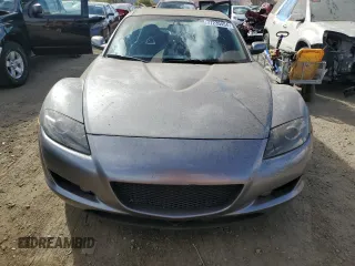 2004 Mazda RX-8 with VIN JM1FE17N240117619, listed as a Copart auction lot 77235454 with 121,887 mi miles and Clean Title. Bid and sale history available at carsss.com. Image 5.