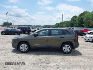 2015 Jeep Cherokee Sport with VIN 1C4PJLAB0FW660722, listed as a IAAI auction lot 42480650 with 272,396 mi miles and . Bid and sale history available at DreamBid. Image 14.