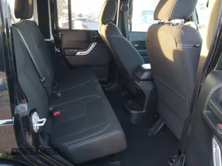 2018 Jeep Wrangler JK Unlimited Sahara with VIN 1C4HJWEG0JL810480, listed as a IAAI auction lot 41260609 with 69,776 mi miles. Bid and sale history available at carsss.com. Image 8.