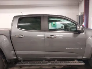 2021 GMC Canyon 4WD Denali with VIN 1GTG6EEN4M1287194, listed as a IAAI auction lot 41571729 with 21,704 mi miles. Bid and sale history available at carsss.com. Image 14.