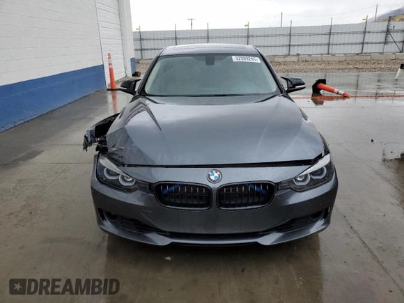 2013 BMW 3 Series 328i xDrive with VIN WBA3B5G50DNS05328, listed as a Copart auction lot 52989285 with 125,516 mi miles and Salvage title. Bid and sale history available at DreamBid. Image 5.