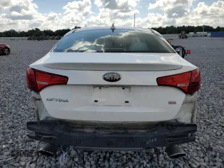 2013 Kia Optima LX z VIN KNAGM4A74D5380729, wystawiony jako Copart lot #56555835 z przebiegiem 126 904 mil mil oraz Szkoda całkowita • Salvage title. Historia ofert i sprzedaży dostępna na DreamBid. Obrazek 6.