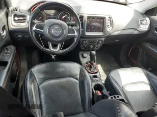2017 Jeep Compass Trailhawk with VIN 3C4NJDDB7HT657463, listed as a Copart auction lot 60650765 with 100,979 mi miles and Salvage title. Bid and sale history available at DreamBid. Image 8.