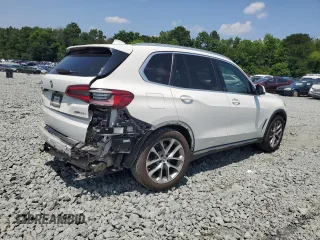 2019 BMW X5 xDrive40i with VIN 5UXCR6C5XKLL61071, listed as a Copart auction lot 60158945 with 67,631 mi miles and Salvage title. Bid and sale history available at DreamBid. Image 3.