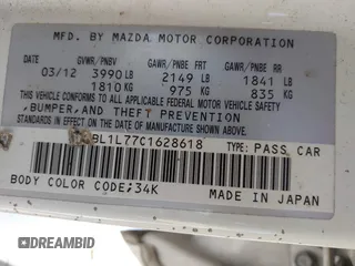 2012 Mazda Mazda3 i Touring with VIN JM1BL1L77C1628618, listed as a IAAI auction lot 42069661 with 201,942 mi miles. Bid and sale history available at carsss.com. Image 9.