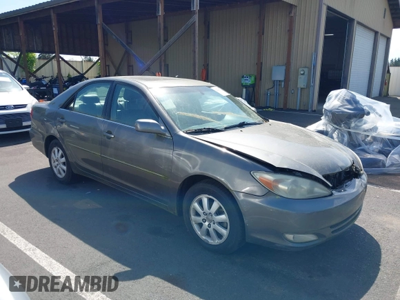2003 Toyota Camry LE with VIN 4T1BE32K03U754857, listed as a IAAI auction lot 42224229 with Not Provided miles and . Bid and sale history available at DreamBid. Image 1.
