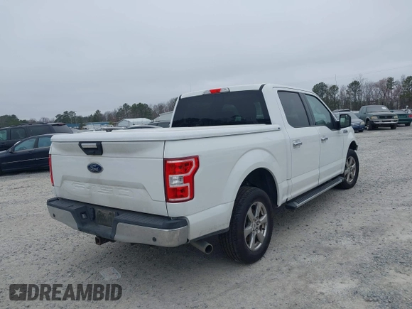 2020 Ford F-150 XL with VIN 1FTEW1C51LFB75537, listed as a IAAI auction lot 41715695 with 76,585 mi miles. Bid and sale history available at carsss.com. Image 4.