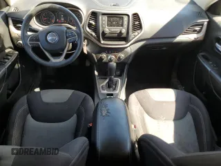 2015 Jeep Cherokee Sport z VIN 1C4PJLAB5FW573186, wystawiony jako Copart lot #61440805 z przebiegiem 144 333 mil mil oraz Szkoda całkowita • Salvage title. Historia ofert i sprzedaży dostępna na DreamBid. Obrazek 8.