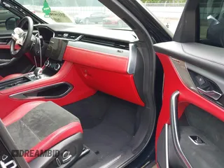 2022 Jaguar F-Pace SVR z VIN SADCZ2EE0NA702862, wystawiony jako IAAI lot #42129192 z przebiegiem 20 580 mil mil oraz . Historia ofert i sprzedaży dostępna na DreamBid. Obrazek 5.