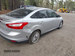 2014 Ford Focus Titanium with VIN 1FADP3J20EL148417, listed as a IAAI auction lot 41954291 with 120,098 mi miles. Bid and sale history available at carsss.com. Image 4.