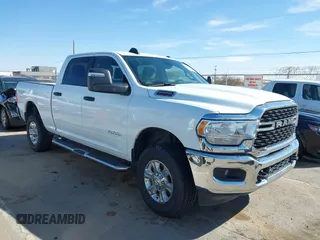 2023 Ram 2500 Big Horn with VIN 3C6UR5DJ5PG587767, listed as a IAAI auction lot 41502643 with 33,256 mi miles. Bid and sale history available at carsss.com. Image 1.